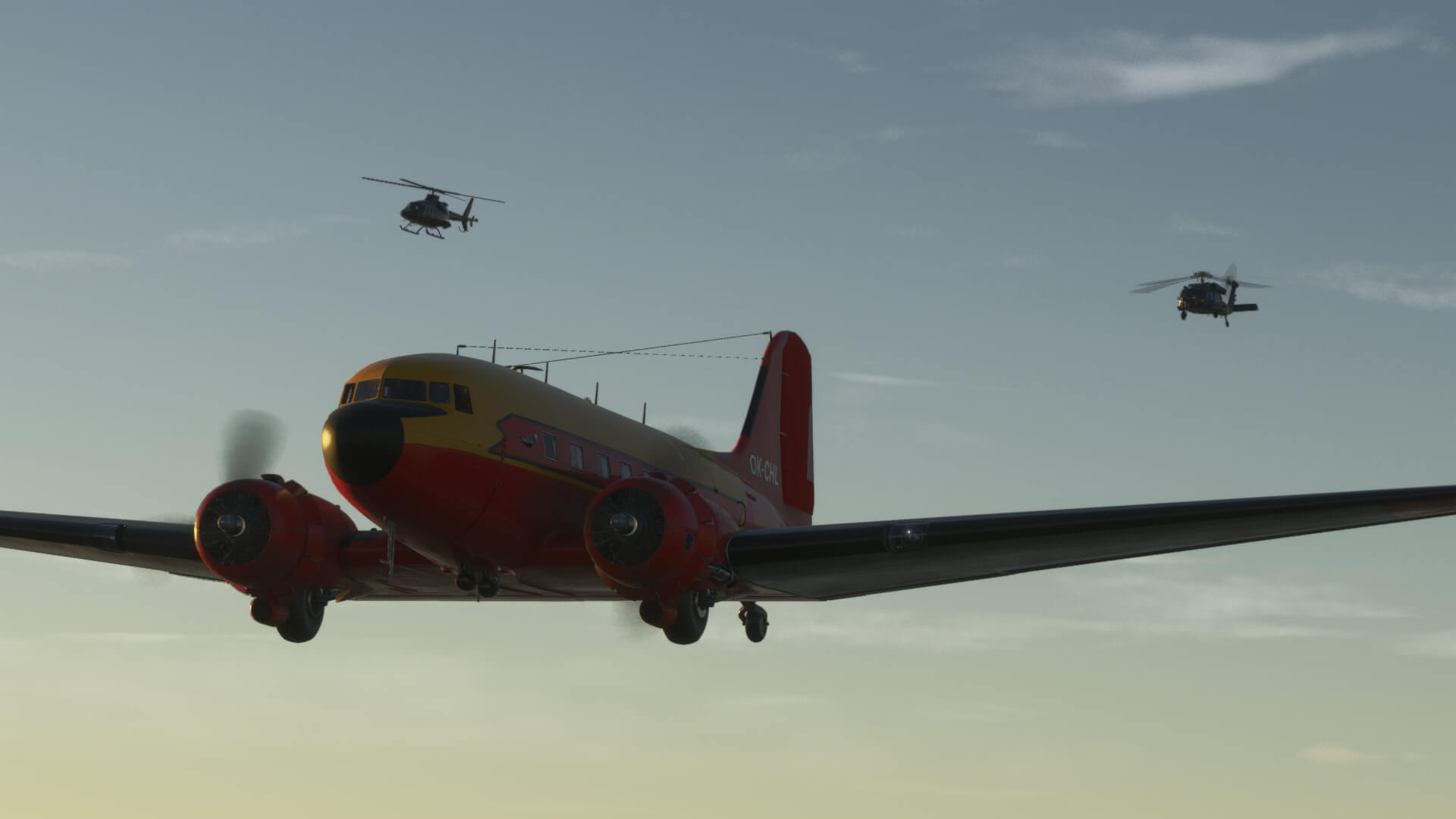 A DC-3 accompanied by helicopters in flight