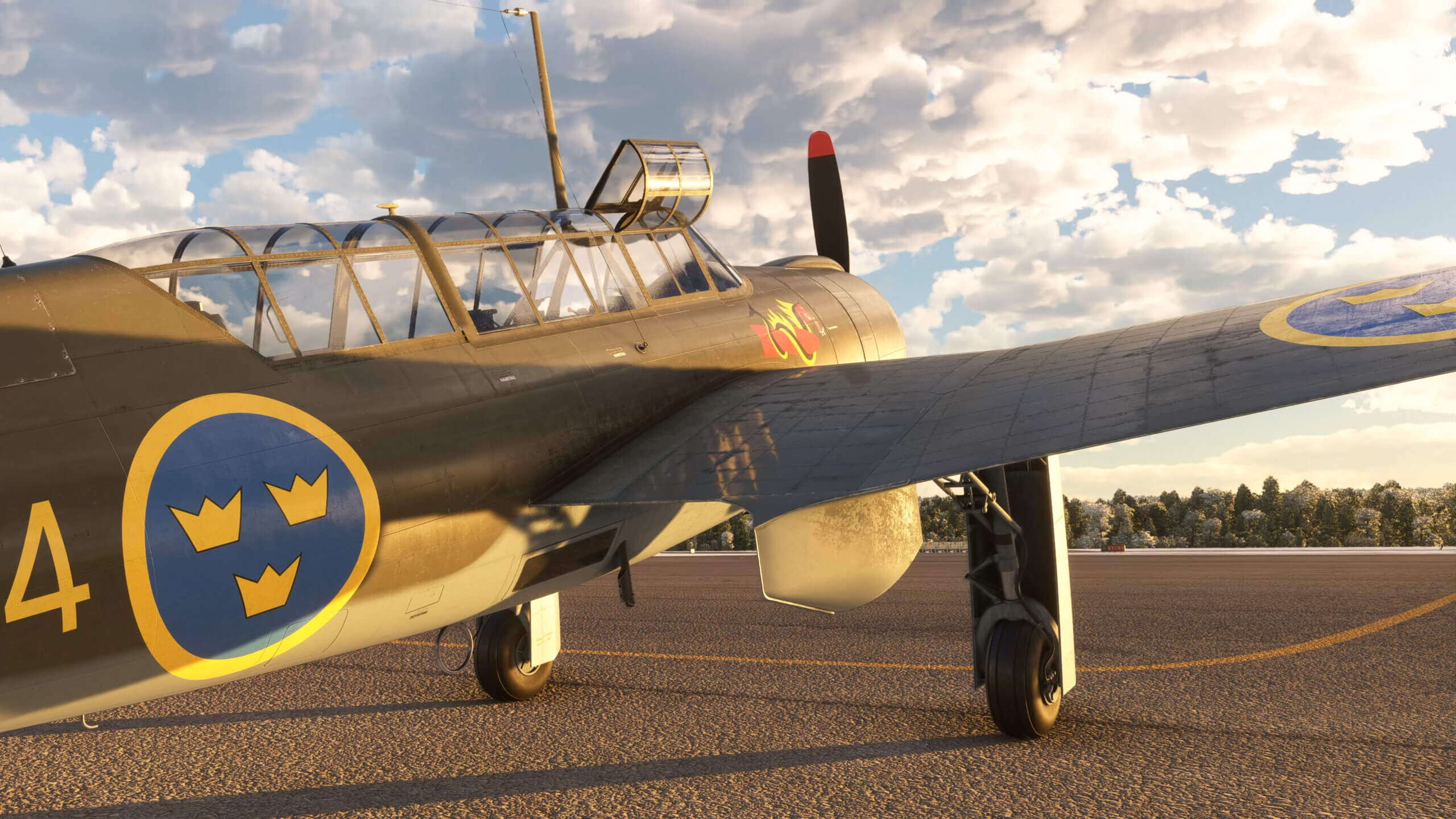 A Saab B 17 parked on the ground with cockpit canopy open