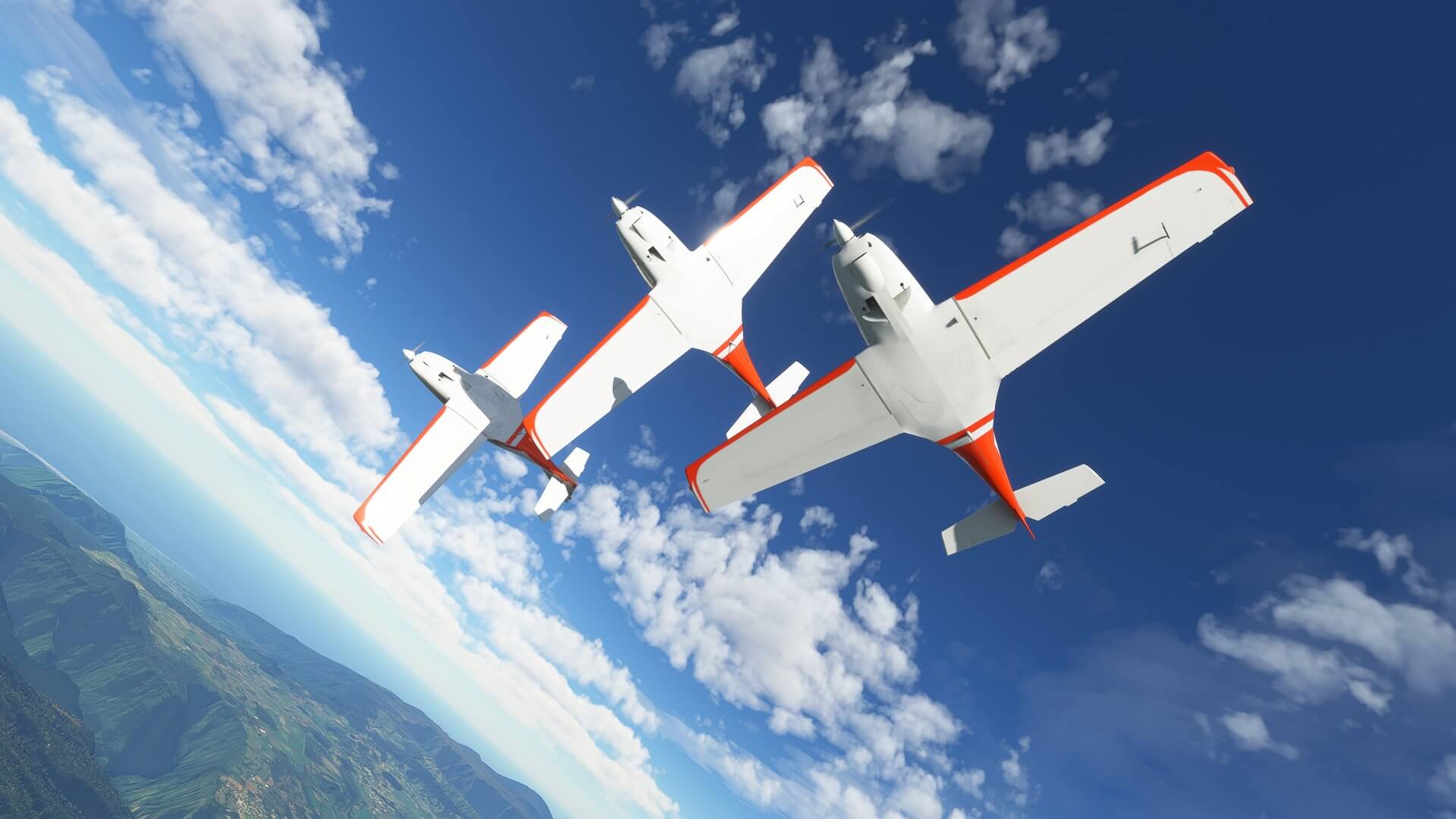 Three planes flying in formation bank execute a banking turn away from the camera.